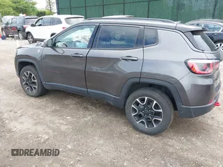 2020 Jeep Compass Trailhawk with VIN 3C4NJDDB3LT200268, listed as a IAAI auction lot 42250192 with 73,804 mi miles and . Bid and sale history available at DreamBid. Image 3.