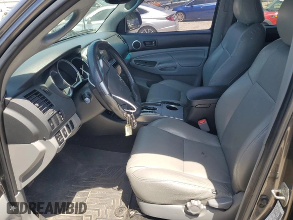 2012 Toyota Tacoma PreRunner with VIN 3TMKU4HN5CM031492, listed as a Copart auction lot 57663845 with 119,825 mi miles and Salvage title. Bid and sale history available at DreamBid. Image 7.