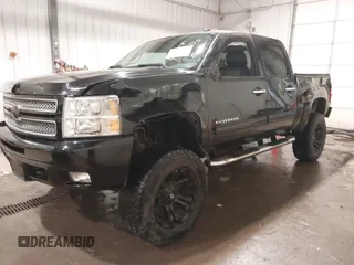 2013 Chevrolet Silverado 1500 LT with VIN 3GCPKSE75DG238194, listed as a IAAI auction lot 40997920 with 163,303 mi miles. Bid and sale history available at carsss.com. Image 2.