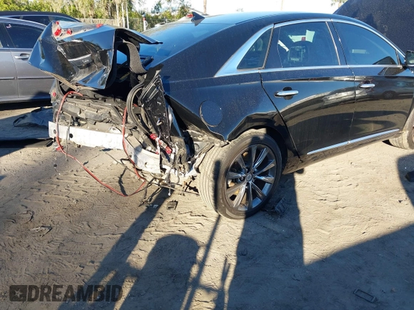 2014 Cadillac XTS with VIN 2G61L5S34E9261034, listed as a IAAI auction lot 41250779 with 178,218 mi miles. Bid and sale history available at carsss.com. Image 6.
