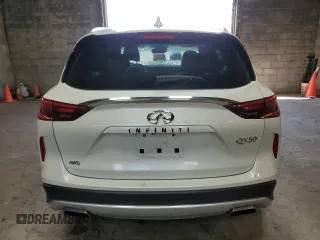 2020 Infiniti QX50 Luxe with VIN 3PCAJ5M3XLF112054, listed as a Copart auction lot 58483235 with 49,815 mi miles and Salvage title. Bid and sale history available at DreamBid. Image 6.