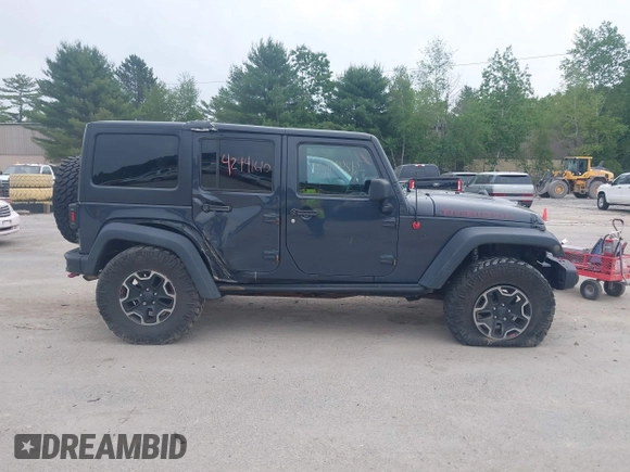 2016 Jeep Wrangler Unlimited Rubicon with VIN 1C4HJWFG6GL346862, listed as a IAAI auction lot 42441610 with 94,227 mi miles and . Bid and sale history available at DreamBid. Image 13.