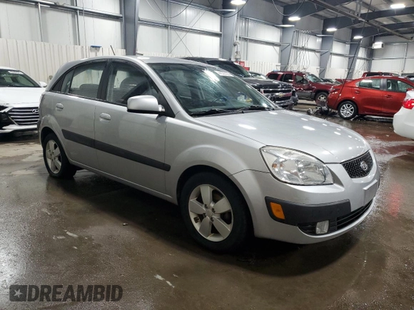 2009 Kia Rio LX with VIN KNADE243196496923, listed as a Copart auction lot 44235725 with 103,171 mi miles and Salvage Title. Bid and sale history available at carsss.com. Image 4.