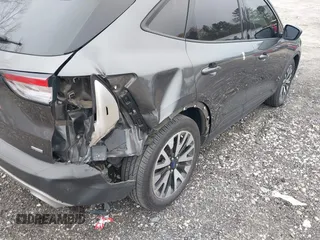 2020 Ford Escape SE Sport Hybrid with VIN 1FMCU0BZ7LUB13398, listed as a IAAI auction lot 41942498 with 118,604 mi miles and . Bid and sale history available at DreamBid. Image 6.