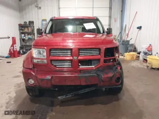 2007 Dodge Nitro R/T with VIN 1D8GU58697W649782, listed as a IAAI auction lot 40898823 with 82,376 mi miles. Bid and sale history available at carsss.com. Image 13.