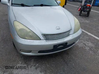 2004 Lexus ES 330 with VIN JTHBA30G740010906, listed as a IAAI auction lot 42171056 with 253,064 mi miles. Bid and sale history available at carsss.com. Image 6.