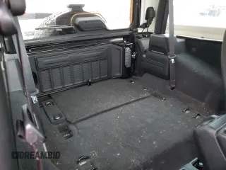 2021 Jeep Wrangler Rubicon z VIN 1C4HJXCG2MW665809, wystawiony jako Copart lot #84007354 z przebiegiem Nie podano mil oraz Szkoda całkowita • Salvage title. Historia ofert i sprzedaży dostępna na DreamBid. Obrazek 10.