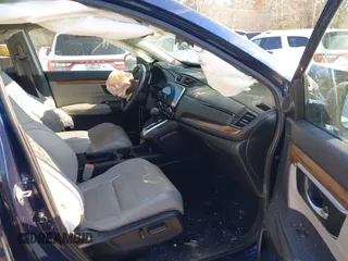 2019 Honda CR-V EX-L with VIN 2HKRW2H80KH643675, listed as a IAAI auction lot 41396375 with 101,296 mi miles and . Bid and sale history available at carsss.com. Image 5.