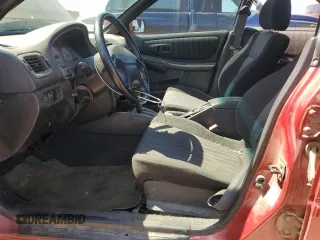 2000 Subaru Impreza RS with VIN JF1GC6751YH501153, listed as a Copart auction lot 58530374 with 91,817 mi miles and Salvage title. Bid and sale history available at DreamBid. Image 7.