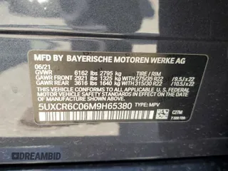 2021 BMW X5 xDrive40i with VIN 5UXCR6C06M9H65380, listed as a Copart auction lot 57445405 with 33,916 mi miles and Salvage title. Bid and sale history available at DreamBid. Image 13.