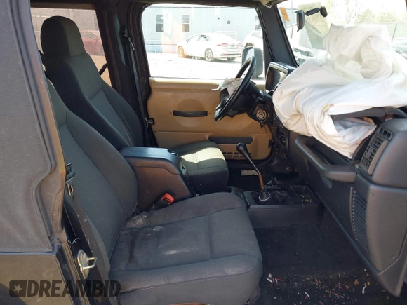 2006 Jeep Wrangler Sport with VIN 1J4FA49S76P718349, listed as a IAAI auction lot 42098356 with 137,804 mi miles and . Bid and sale history available at carsss.com. Image 5.