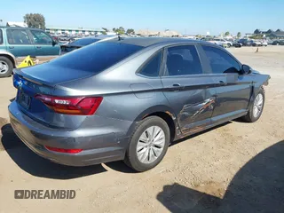 2019 Volkswagen Jetta S with VIN 3VWC57BU9KM093282, listed as a IAAI auction lot 42604217 with 91,847 mi miles and . Bid and sale history available at DreamBid. Image 4.