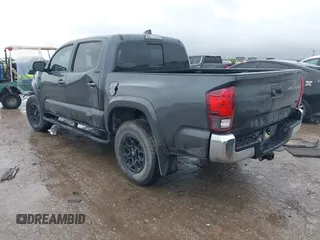 2022 Toyota Tacoma SR5 with VIN 3TMAZ5CN9NM195132, listed as a IAAI auction lot 42383482 with 51,011 mi miles and . Bid and sale history available at DreamBid. Image 3.