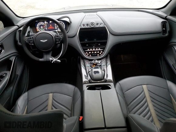 2023 Aston Martin DBX 707 z VIN SD7VUJBW5PTV06160, wystawiony jako Copart lot #76512973 z przebiegiem Nie podano mil oraz . Historia ofert i sprzedaży dostępna na DreamBid. Obrazek 8.