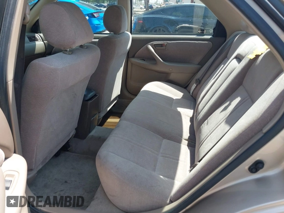 1999 Toyota Camry LE z VIN JT2BG22K1X0369726, wystawiony jako IAAI lot #42354218 z przebiegiem 213 828 mil mil oraz . Historia ofert i sprzedaży dostępna na DreamBid. Obrazek 8.