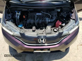 2015 Honda Fit EX z VIN 3HGGK5G82FM745065, wystawiony jako Copart lot #58358525 z przebiegiem 104 769 mil mil oraz Szkoda całkowita • Salvage title. Historia ofert i sprzedaży dostępna na DreamBid. Obrazek 12.