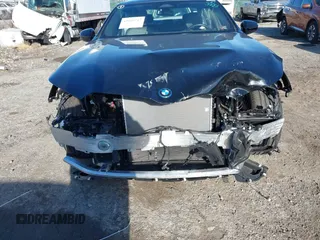2024 BMW i5 eDrive40 with VIN WBY33FK00RCP37858, listed as a IAAI auction lot 41016747 with Not provided miles and . Bid and sale history available at DreamBid. Image 6.