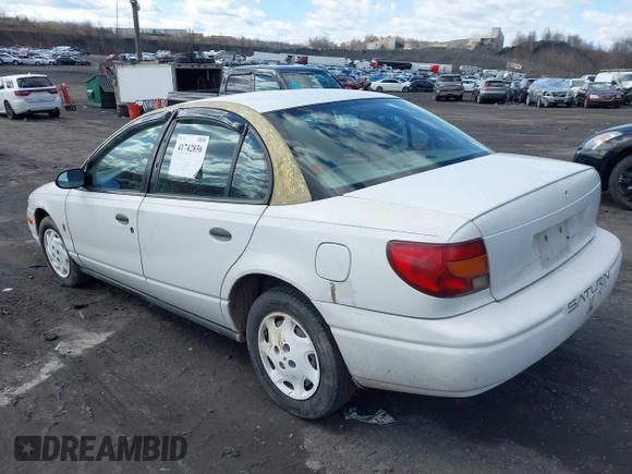 2000 Saturn SL z VIN 1G8ZH5280YZ251280, wystawiony jako IAAI lot #41742836 z przebiegiem 180 249 mil mil oraz . Historia ofert i sprzedaży dostępna na DreamBid. Obrazek 3.