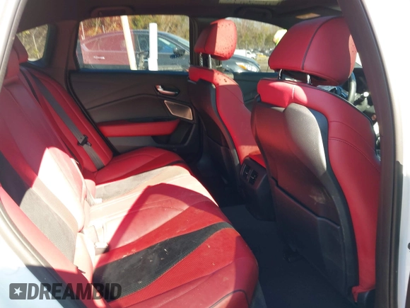 2022 Acura TLX w/A-Spec Package with VIN 19UUB6F52NA002062, listed as a IAAI auction lot 41853469 with 77,301 mi miles and . Bid and sale history available at DreamBid. Image 8.