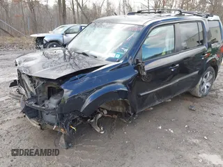 2012 Honda Pilot Touring with VIN 5FNYF4H93CB071923, listed as a IAAI auction lot 41946074 with 175,663 mi miles and . Bid and sale history available at carsss.com. Image 2.