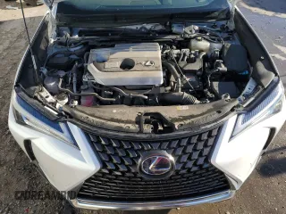 2021 Lexus UX 250h z VIN JTHP9JBH4M2038336, wystawiony jako Copart lot #49616235 z przebiegiem 20 939 mil mil oraz Szkoda całkowita • Salvage title. Historia ofert i sprzedaży dostępna na DreamBid. Obrazek 11.