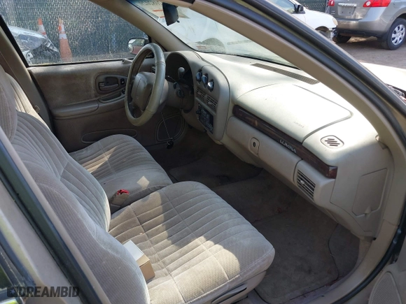 1999 Chevrolet Lumina with VIN 2G1WL52M3X9189217, listed as a IAAI auction lot 42082029 with 211,500 mi miles. Bid and sale history available at carsss.com. Image 5.