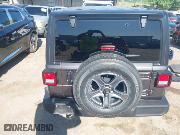 2021 Jeep Wrangler Unlimited Sport S with VIN 1C4HJXDG3MW801301, listed as a IAAI auction lot 42319387 with Not provided miles and . Bid and sale history available at DreamBid. Image 16.
