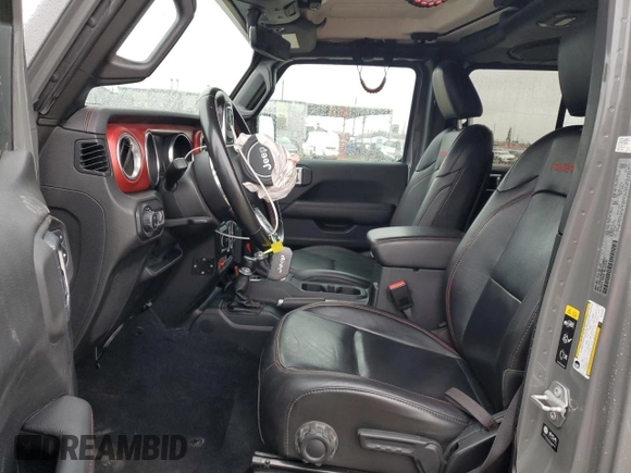 2021 Jeep Gladiator Rubicon with VIN 1C6JJTBG5ML615653, listed as a Copart auction lot 51297795 with 48,918 mi miles and Salvage title. Bid and sale history available at DreamBid. Image 7.