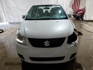 2012 Suzuki SX4 LE with VIN JS2YC5A39C6303530, listed as a Copart auction lot 88015395 with 179,751 mi miles and Salvage Title. Bid and sale history available at carsss.com. Image 5.