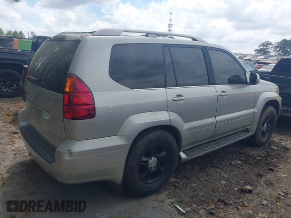 2004 Lexus GX 470 with VIN JTJBT20X140029695, listed as a IAAI auction lot 41960374 with 219,894 mi miles and . Bid and sale history available at DreamBid. Image 4.