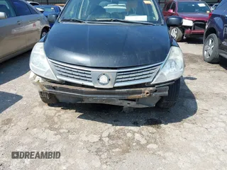 2009 Nissan Versa 1.8 S with VIN 3N1BC13E59L499006, listed as a IAAI auction lot 41953194 with 179,330 mi miles. Bid and sale history available at carsss.com. Image 6.
