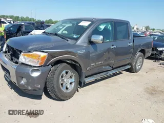 2015 Nissan Titan SV z VIN 1N6BA0ED5FN508975, wystawiony jako IAAI lot #42032737 z przebiegiem 97 432 mil mil oraz . Historia ofert i sprzedaży dostępna na DreamBid. Obrazek 2.
