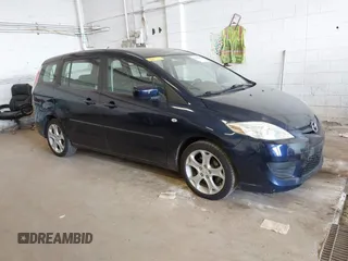 2009 Mazda 5 Touring z VIN JM1CR29L990334150, wystawiony jako IAAI lot #42395807 z przebiegiem 95 412 mil mil oraz . Historia ofert i sprzedaży dostępna na DreamBid. Obrazek 1.