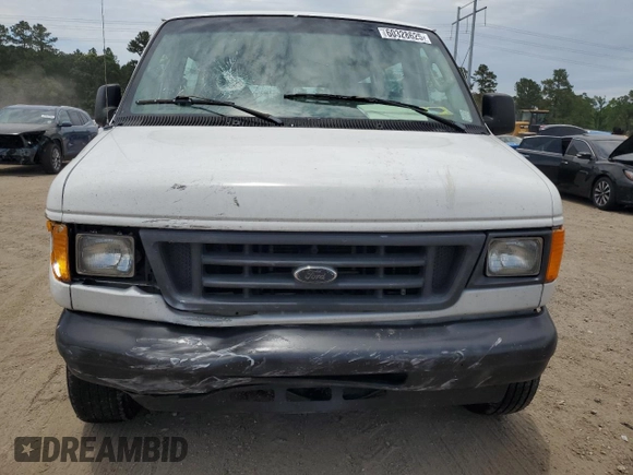 2004 Ford Econoline Passenger XL with VIN 1FBSS31L04HB37562, listed as a Copart auction lot 60328625 with 130,252 mi miles and Salvage title. Bid and sale history available at DreamBid. Image 5.