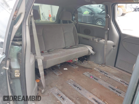 2003 Dodge Grand Caravan with VIN 2D4GP44313R240791, listed as a IAAI auction lot 41937009 with 231,913 mi miles and . Bid and sale history available at DreamBid. Image 8.