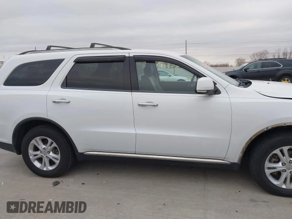 2013 Dodge Durango Crew with VIN 1C4RDHDG5DC617061, listed as a IAAI auction lot 41385801 with 142,304 mi miles. Bid and sale history available at carsss.com. Image 14.