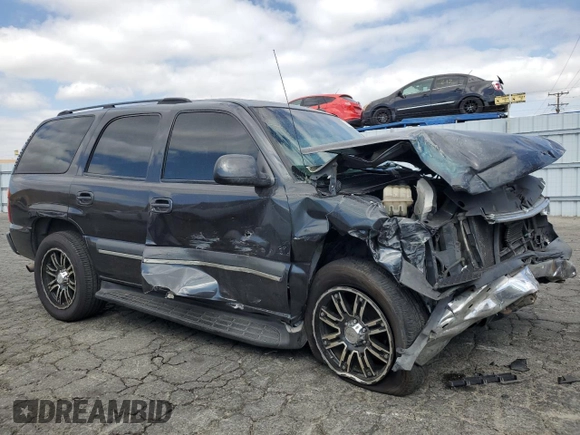 2003 Chevrolet Tahoe LT with VIN 1GNEC13TX3R293907, listed as a Copart auction lot 71849144 with 238,669 mi miles and Salvage Title. Bid and sale history available at carsss.com. Image 4.
