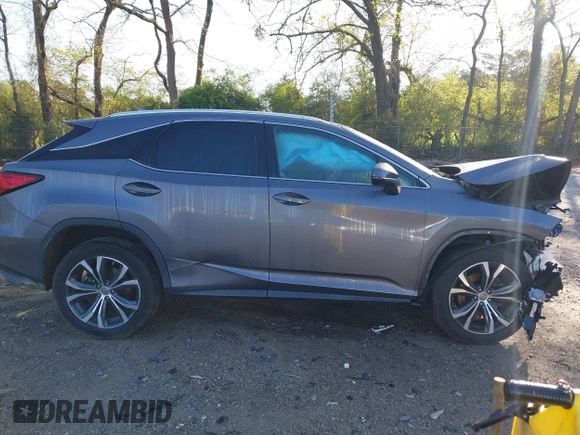 2016 Lexus RX 350 with VIN 2T2ZZMCA3GC004189, listed as a IAAI auction lot 41987707 with 95,562 mi miles and . Bid and sale history available at DreamBid. Image 13.