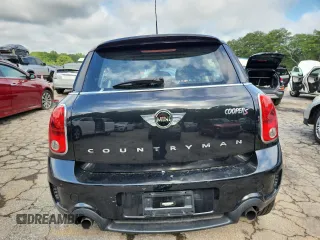 2014 MINI Countryman S with VIN WMWZC3C56EWP25479, listed as a Copart auction lot 61197525 with 101,146 mi miles and Salvage title. Bid and sale history available at DreamBid. Image 6.