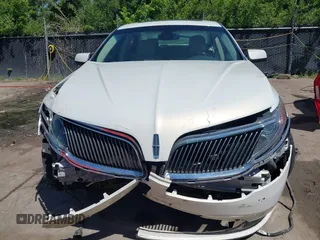 2013 Lincoln MKS z VIN 1LNHL9DK4DG611605, wystawiony jako IAAI lot #42271526 z przebiegiem 204 239 mil mil oraz . Historia ofert i sprzedaży dostępna na DreamBid. Obrazek 13.