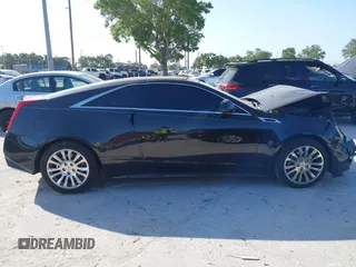 2012 Cadillac CTS Premium z VIN 1G6DP1E3XC0116593, wystawiony jako IAAI lot #42138575 z przebiegiem 198 884 mil mil oraz . Historia ofert i sprzedaży dostępna na DreamBid. Obrazek 13.