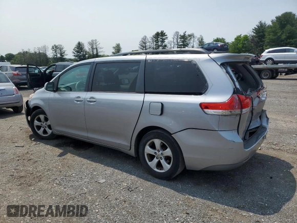 2011 Toyota Sienna LE AAS with VIN 5TDKK3DC0BS172912, listed as a Copart auction lot 59178015 with 137,140 mi miles and Salvage title. Bid and sale history available at DreamBid. Image 2.
