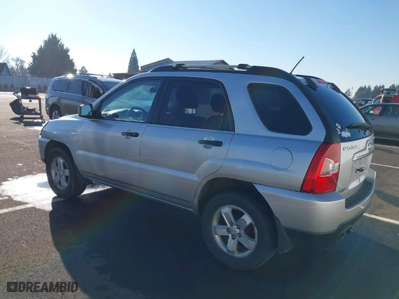 2009 Kia Sportage LX with VIN KNDJE723X97575927, listed as a IAAI auction lot 41014278 with 143,376 mi miles. Bid and sale history available at carsss.com. Image 3.