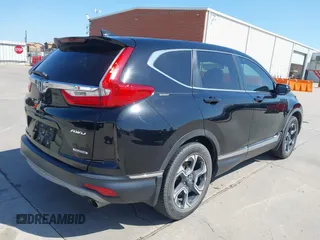 2018 Honda CR-V Touring with VIN 2HKRW2H91JH630702, listed as a IAAI auction lot 41983516 with 84,355 mi miles. Bid and sale history available at carsss.com. Image 4.