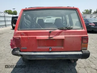1996 Jeep Cherokee SE with VIN 1J4FT28S3TL213153, listed as a Copart auction lot 57217625 with 331,741 mi miles and Salvage title. Bid and sale history available at DreamBid. Image 6.