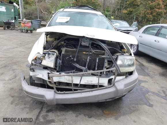 2003 Jeep Grand Cherokee Laredo with VIN 1J4GW48S33C521253, listed as a IAAI auction lot 41929756 with 209,686 mi miles. Bid and sale history available at carsss.com. Image 6.