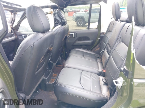 2023 Jeep Wrangler Sahara with VIN 1C4JJXP60PW556336, listed as a IAAI auction lot 39553199 with 10,437 mi miles and . Bid and sale history available at DreamBid. Image 8.