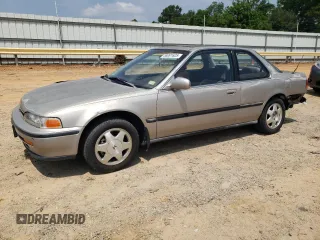 1992 Honda Accord с VIN 1HGCB727XNA039613, выставлен на аукционе Copart как лот 58091625 с пробегом 222 582 миль миль и Списание • Salvage title. История ставок и продаж доступна на DreamBid. Изображение 1.