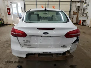 2015 Ford Focus SE z VIN 1FADP3F20FL241951, wystawiony jako Copart lot #89021775 z przebiegiem 91 698 mil mil oraz Szkoda całkowita • Salvage title. Historia ofert i sprzedaży dostępna na DreamBid. Obrazek 6.