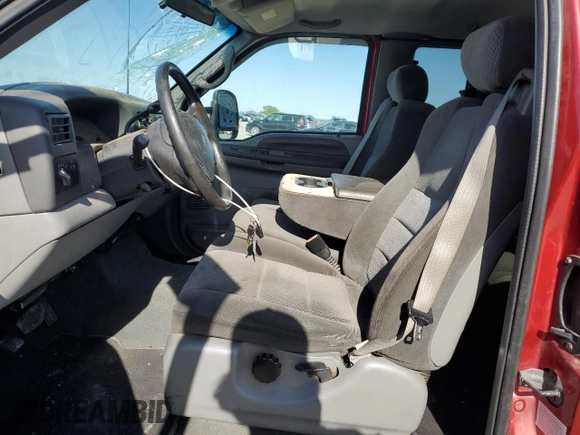2002 Ford F-250 XL with VIN 1FTNX20F02EB64128, listed as a Copart auction lot 51979895 with 162,117 mi miles and Salvage title. Bid and sale history available at DreamBid. Image 7.